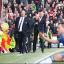 Touchline battle: Blues boss Rafael Benitez and Bees chief Uwe Rosler keep a close eye on the action