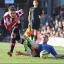 Warning: Harry Forrester gets the better of Chelsea's Branislav Ivanovic