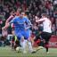 Tough day at the office: Sam Saunders tackles England international Frank Lampard