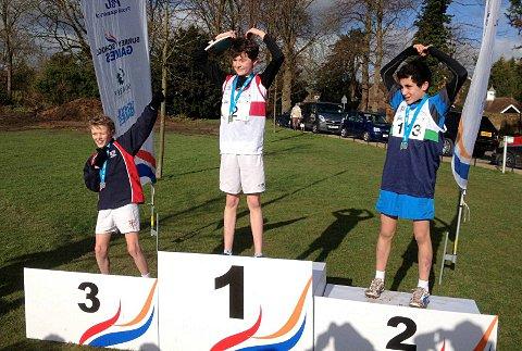Watch out Mo: Angus Harrington gets use to life on the highest podium at the Surrey Schools Cross Country Championships
