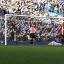Decisive: Bees are down-hearted after Oscar scores Chelsea's all-important second goal at Stamford Bridge    SP74039