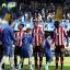 Not here to make up the numbers: Brentford and Chelsea greet each other ahead of the FA Cup replay on Sunday        SP74039