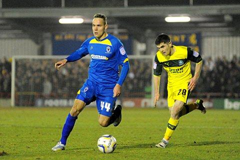 On the attack: Chris Hussey moves forward during the 1-1 draw with Plymouth on Tuesday night    SP74266