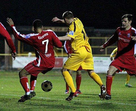 You Beauty: Harry Beautyman is about to score the winning goal on a thrilling night at Gander Green Lane Picture: Paul Loughlin