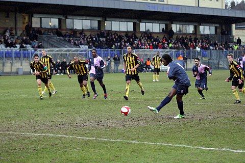 Man in demand: Danny Carr scores one of his many goals for Dulwich Hamlet   SP72946