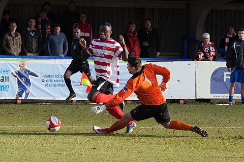 Not this time: Ks Nathan Koranteng tries to round the goalkeeper in the 2-0 defeat to Bury Town SP72987