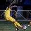 Try this for size: Sutton United's Rhys Murrell-Williamson forces a save from AFC Wimbledon keeper Seb Brown Picture: Paul Loughlo