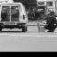 A police photographer takes pictures at the scene of the car bomb in Rotton Row, Hyde Park, London, in July 1982