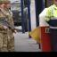 Armed servicemen outside The Royal Artillery Barracks in Woolwich (PA)