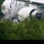 Passengers disembark Pakistan International Airlines flight PK709 at Stansted Airport
