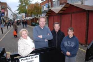 Dejected: Councillor David Pickles with market traders Evelyn and Harry Baum and Kerry Coppock