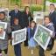 Pupils from Fircroft Primary School show off their winning paintings.