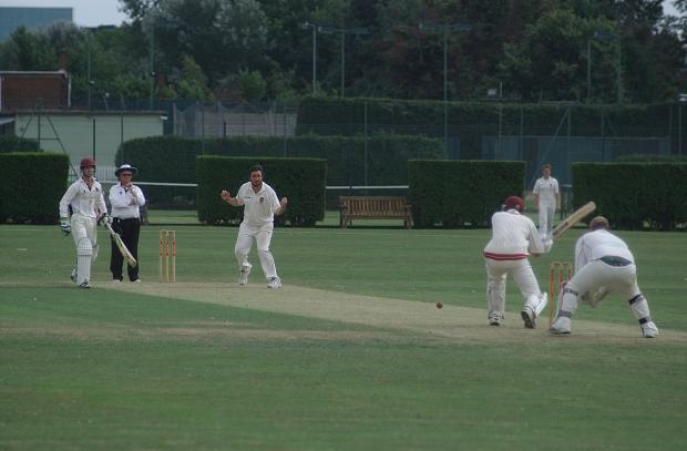 Streatham Guardian: Looking good: Spencer bowler Darren O’Shea tries to outfox East Molesey’s Robbie Heald on Saturday SP78438 Streatham Guardian: Looking good: Spencer bowler Darren O’Shea tries to outfox East Molesey’s Robbie Heald on Saturday SP78438