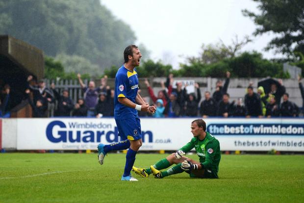 Happy times: Jack Midson celebrates the winner against Scunthorpe United SP73011