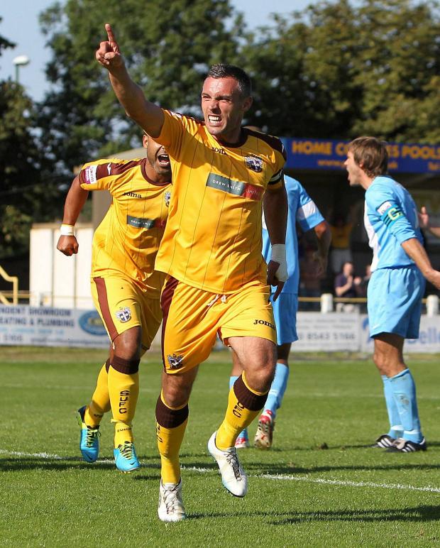 Streatham Guardian: Captain fantastic: Jamie Stuart opens the scoring against Whitehawk on Saturday Picture: Paul Loughlin Streatham Guardian: Captain fantastic: Jamie Stuart opens the scoring against Whitehawk on Saturday Picture: Paul Loughlin