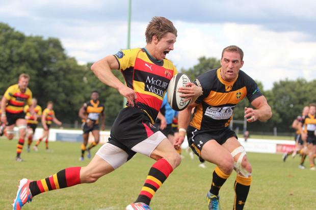 Happy times: Esher celebrate a Jay Udo-Udoma try in the 28-22 win at neighbours Richmond SP79128