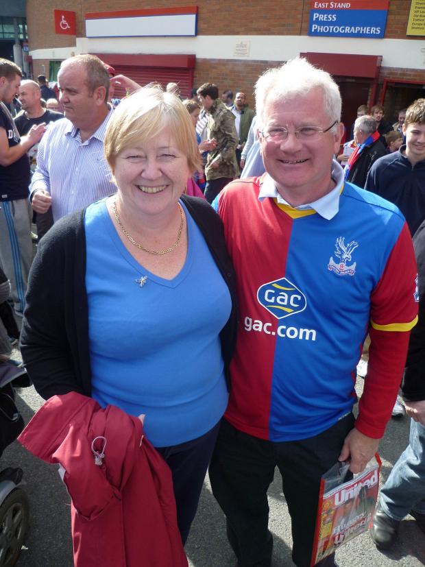 Streatham Guardian: Glad all over: Palace fans Marian and Angus Hamilton enjoy thier day at Old Trafford Streatham Guardian: Glad all over: Palace fans Marian and Angus Hamilton enjoy thier day at Old Trafford