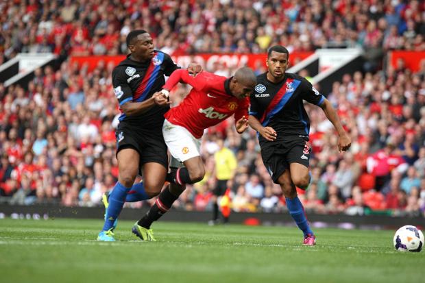 Big moment: Ashley Young goes down outside the area under KG's challenge, but the referee awarded a spot kick