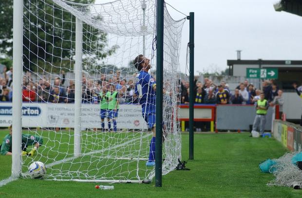 Shakin' all over: Jack Midson celebrates his first goal of the season SP79023