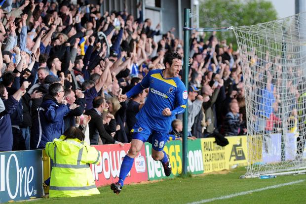 Enjoying life: Dons defender Alan Bennett