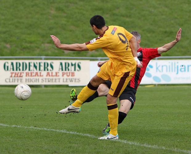 Bang: Jamie Slabber fires Sutton United into the fourth qualifying round of the FA Cup at the expense of Lewes Picture: Paul Loughlin