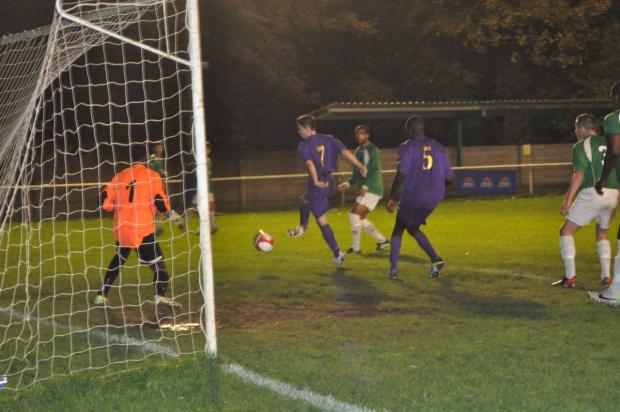 Four-some: Tommy Bradford scores in the Surrey Senior Cup 4-0 win at Whyteleafe on Tuesday night