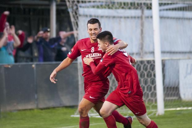 Happy times as a Robin: Luke Pigden celebrates a goal for Carshalton Athletic with mate Tommy Bradford SP78480