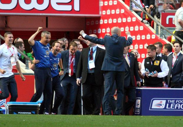Happier times: Keith Millen and Ian Holloway celebrate winning promotion to the Premier League, but it went downhill from there SP76612