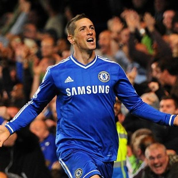 Fernando Torres scored the winner in a 2-1 victory over Manchester City