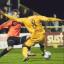 Streatham Guardian: Job Dun: Craig Dundas pokes the ball past the advancing Hemel keeper to seal Sutton United's safe passage to the first round of the FA Cup SP80484 Streatham Guardian: Job Dun: Craig Dundas pokes the ball past the advancing Hemel keeper to seal Sutton United's safe passage to the first round of the FA Cup SP80484