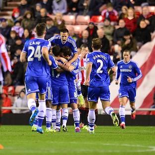 Streatham Guardian: Eden Hazard, obscured, is mobbed by team-mates after scoring Chelsea's second in the 4-3 win at Sunderland. Picture: Press Association Streatham Guardian: Eden Hazard, obscured, is mobbed by team-mates after scoring Chelsea's second in the 4-3 win at Sunderland. Picture: Press Association