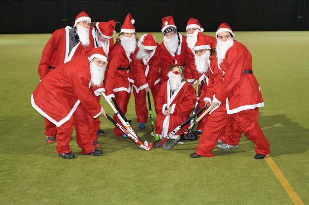 Streatham Guardian: Run and ready: Teddington Hockey Club's mystery Santas get ready for last week's Bushy Park fun run Streatham Guardian: Run and ready: Teddington Hockey Club's mystery Santas get ready for last week's Bushy Park fun run