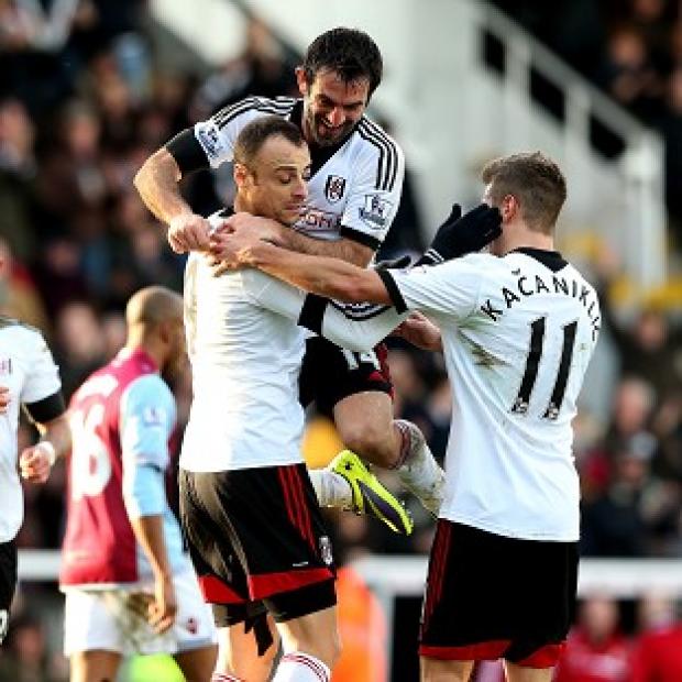Streatham Guardian: Dimitar Berbatov, centre, scored the second goal from the spot Streatham Guardian: Dimitar Berbatov, centre, scored the second goal from the spot