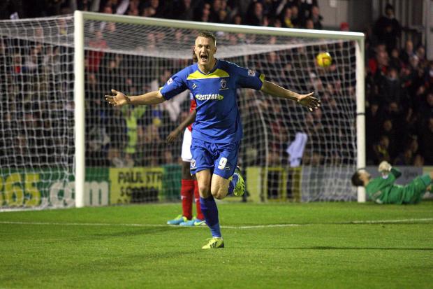 Streatham Guardian: Talisman: Michael Smith has scored eight League Two goals for the Dons this season SP81216 Streatham Guardian: Talisman: Michael Smith has scored eight League Two goals for the Dons this season SP81216