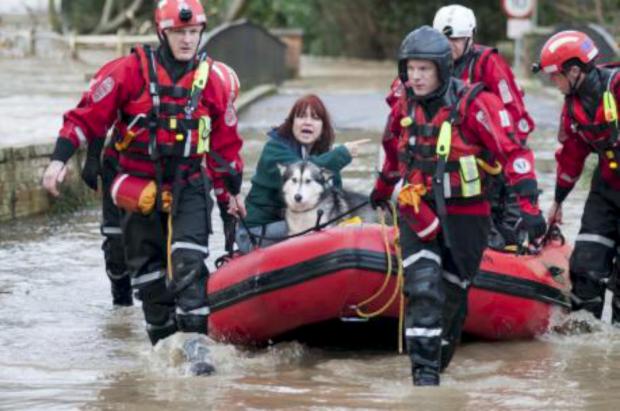 Streatham Guardian: People and pets have been rescued from their flooded homes in Leatherhead Streatham Guardian: People and pets have been rescued from their flooded homes in Leatherhead