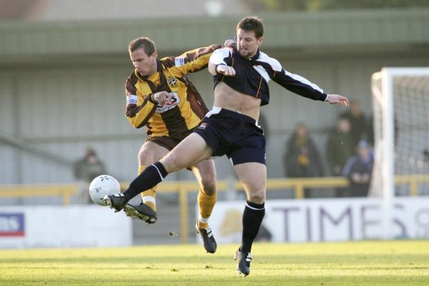Streatham Guardian: New man: Darren Jones, right, in action for Newport County against Sutton United in 2005, has signed for the Dons in a deal boss Neal Ardley simply described as “wow” Streatham Guardian: New man: Darren Jones, right, in action for Newport County against Sutton United in 2005, has signed for the Dons in a deal boss Neal Ardley simply described as “wow”
