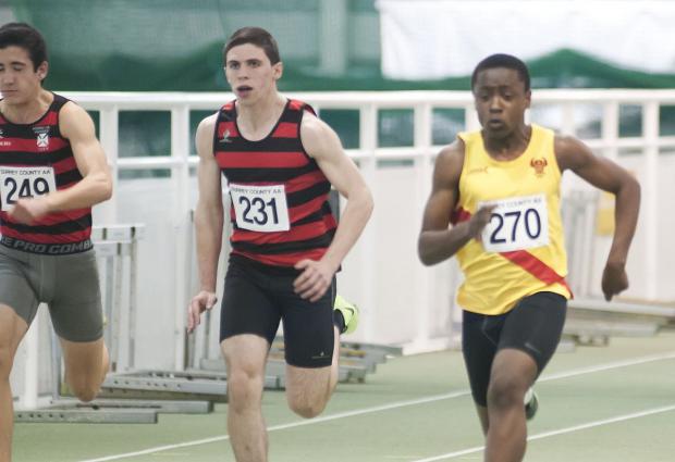 Streatham Guardian: Battle: Herne Hill Harriers' Anthony Flanagan and Raphael Buckle of Hercules Wimbledon fight it out over 60m Streatham Guardian: Battle: Herne Hill Harriers' Anthony Flanagan and Raphael Buckle of Hercules Wimbledon fight it out over 60m