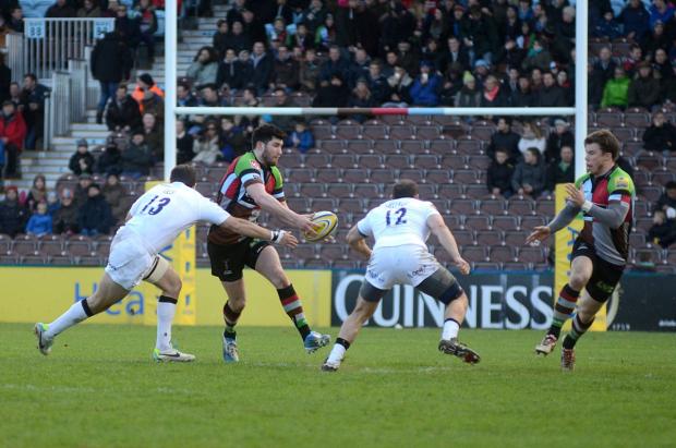 Streatham Guardian: Off: Quins winger Sam Smith, right, collects a pass from Tom Casson against Newcastle Falcons on Saturday Streatham Guardian: Off: Quins winger Sam Smith, right, collects a pass from Tom Casson against Newcastle Falcons on Saturday