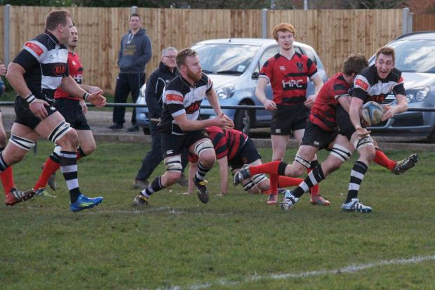 Streatham Guardian: Here: James Caddy offloads to Shawn Renwick for his second try of the afternoon All pictures: Dave Jackson Streatham Guardian: Here: James Caddy offloads to Shawn Renwick for his second try of the afternoon All pictures: Dave Jackson