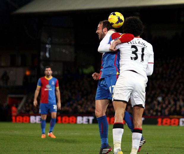 Streatham Guardian: Glenn Murray and Marouance Fellaini challenge for a header on Saturday. EDMUND BOYDEN. Streatham Guardian: Glenn Murray and Marouance Fellaini challenge for a header on Saturday. EDMUND BOYDEN.