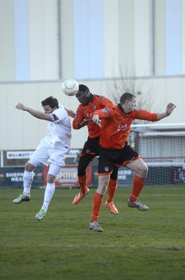 Streatham Guardian: Up for it: Goalscorers Jamal Jimoh, centre, and Simon Huckle challenge for the ball on Saturday Streatham Guardian: Up for it: Goalscorers Jamal Jimoh, centre, and Simon Huckle challenge for the ball on Saturday