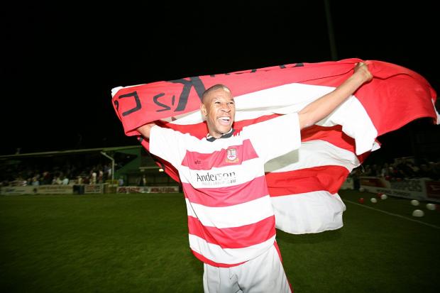 Streatham Guardian: Past glories: Striker Tony Reid celebrates Kingstonian's last Surrey Senior Cup triumph in 2006 Streatham Guardian: Past glories: Striker Tony Reid celebrates Kingstonian's last Surrey Senior Cup triumph in 2006