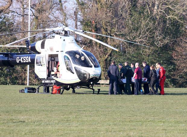 Streatham Guardian: Air ambulance: Jack Fishwick was air lifted to hospital after being injured in Wimbledon's match at Haywards Heath Picture: warwickpics.com Streatham Guardian: Air ambulance: Jack Fishwick was air lifted to hospital after being injured in Wimbledon's match at Haywards Heath Picture: warwickpics.com
