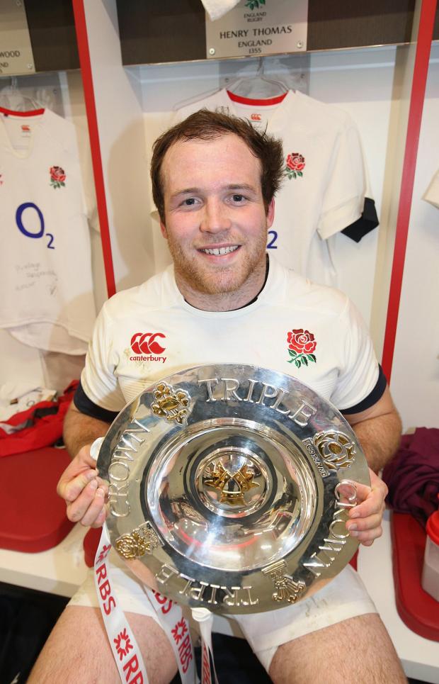 Streatham Guardian: Change is coming: Henry Thomas in the England dressing room with the Triple Crown trophy Streatham Guardian: Change is coming: Henry Thomas in the England dressing room with the Triple Crown trophy