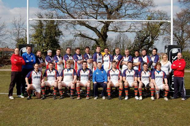 Streatham Guardian: We’re going up: KCS Old Boys skipper Patrick Smith, front row centre in blue, is determined to round off the season in style Streatham Guardian: We’re going up: KCS Old Boys skipper Patrick Smith, front row centre in blue, is determined to round off the season in style