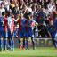 Streatham Guardian: Get in there: Crystal Palace's Joe LEdley, centre, celebrates his side's good fortune with team-mates on Saturday Streatham Guardian: Get in there: Crystal Palace's Joe LEdley, centre, celebrates his side's good fortune with team-mates on Saturday