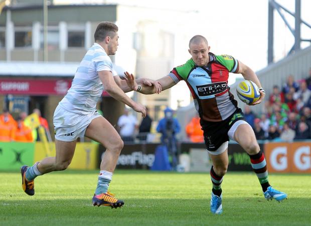 Streatham Guardian: Big impact: Harlequins full back Mike Brown hands off London Irish’s Australia international James O’Connor during Saturday’s vital 23-9 Premiership triumph at the Stoop Streatham Guardian: Big impact: Harlequins full back Mike Brown hands off London Irish’s Australia international James O’Connor during Saturday’s vital 23-9 Premiership triumph at the Stoop