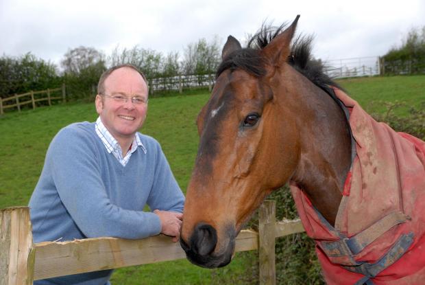 Streatham Guardian: Grand National winner Pineau De Re with trainer Dr Richard Newland, who stopped practising as a GP Streatham Guardian: Grand National winner Pineau De Re with trainer Dr Richard Newland, who stopped practising as a GP