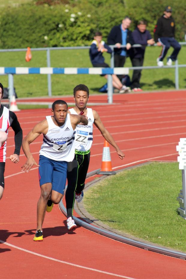 Streatham Guardian: Silver show: Brandon Mitchell hands to Damien Powell in the 4x100m as Croydon Harriers claim the runners up spot Picture: Karen Fossett Streatham Guardian: Silver show: Brandon Mitchell hands to Damien Powell in the 4x100m as Croydon Harriers claim the runners up spot Picture: Karen Fossett