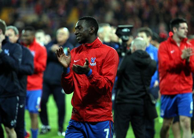 Streatham Guardian: Yannick Bolasie applauds the Palace fans after Monday's 3-3 draw with Liverpool. Picture by Edmund Boyden. Streatham Guardian: Yannick Bolasie applauds the Palace fans after Monday's 3-3 draw with Liverpool. Picture by Edmund Boyden.